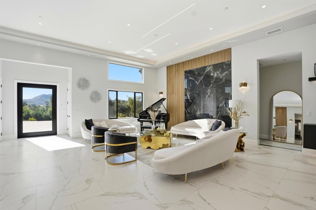 14989 Orchard View Drive Poway, CA 92064 - Photo 4 of 50 a living room with furniture and a window