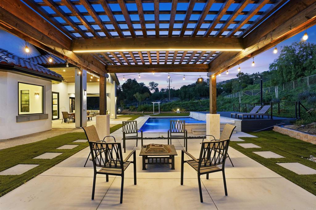 14989 Orchard View Drive Poway, CA 92064 - Photo 41 of 50 a patio with yard glass top table and chairs