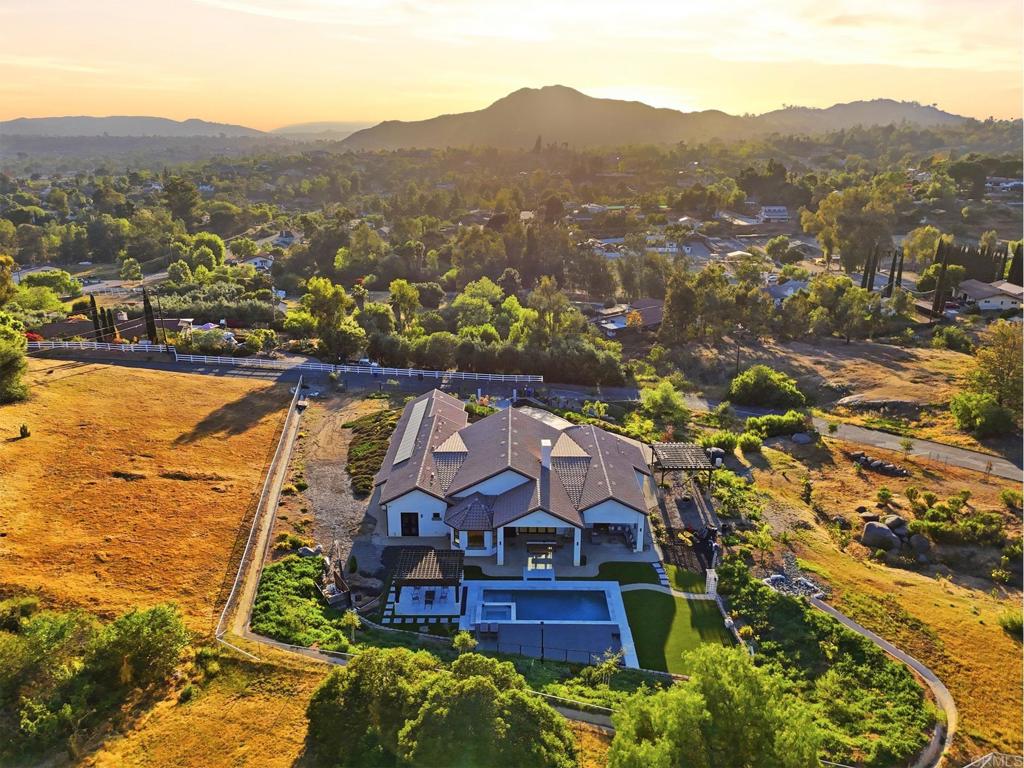 14989 Orchard View Drive Poway, CA 92064 - Photo 46 of 50 an aerial view of a house with a mountain