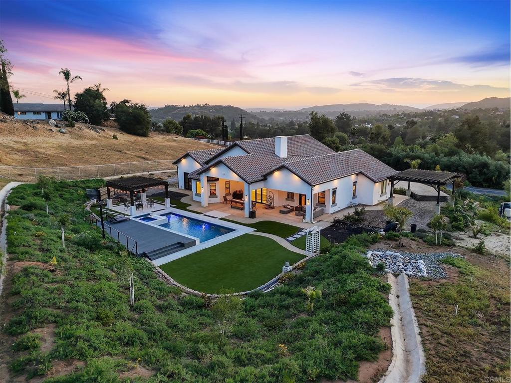 14989 Orchard View Drive Poway, CA 92064 - Photo 6 of 50 an aerial view of a house with a garden
