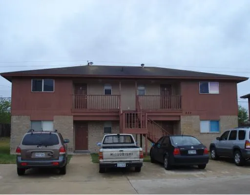 a car parked in front of a house