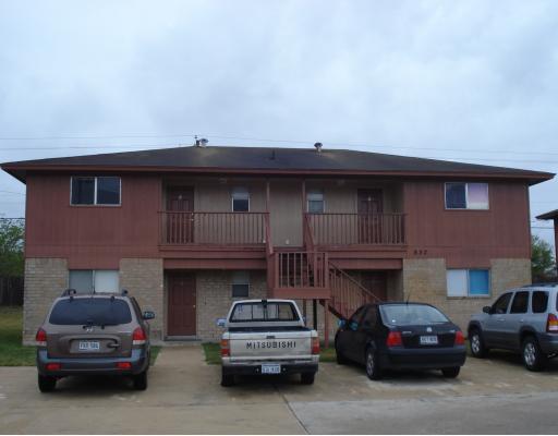 a car parked in front of a house