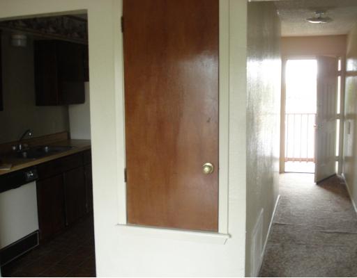 857 Quetzal Street, Unit 3 Corpus Christi, TX 78418 - Photo 10 of 10 a view of a bathroom from a hallway