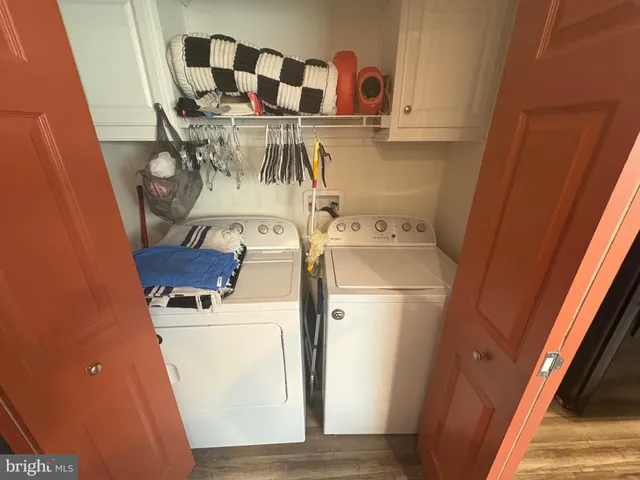 a view of a living room and dining room
