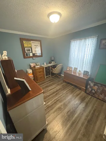 a bathroom with a toilet sink and shower