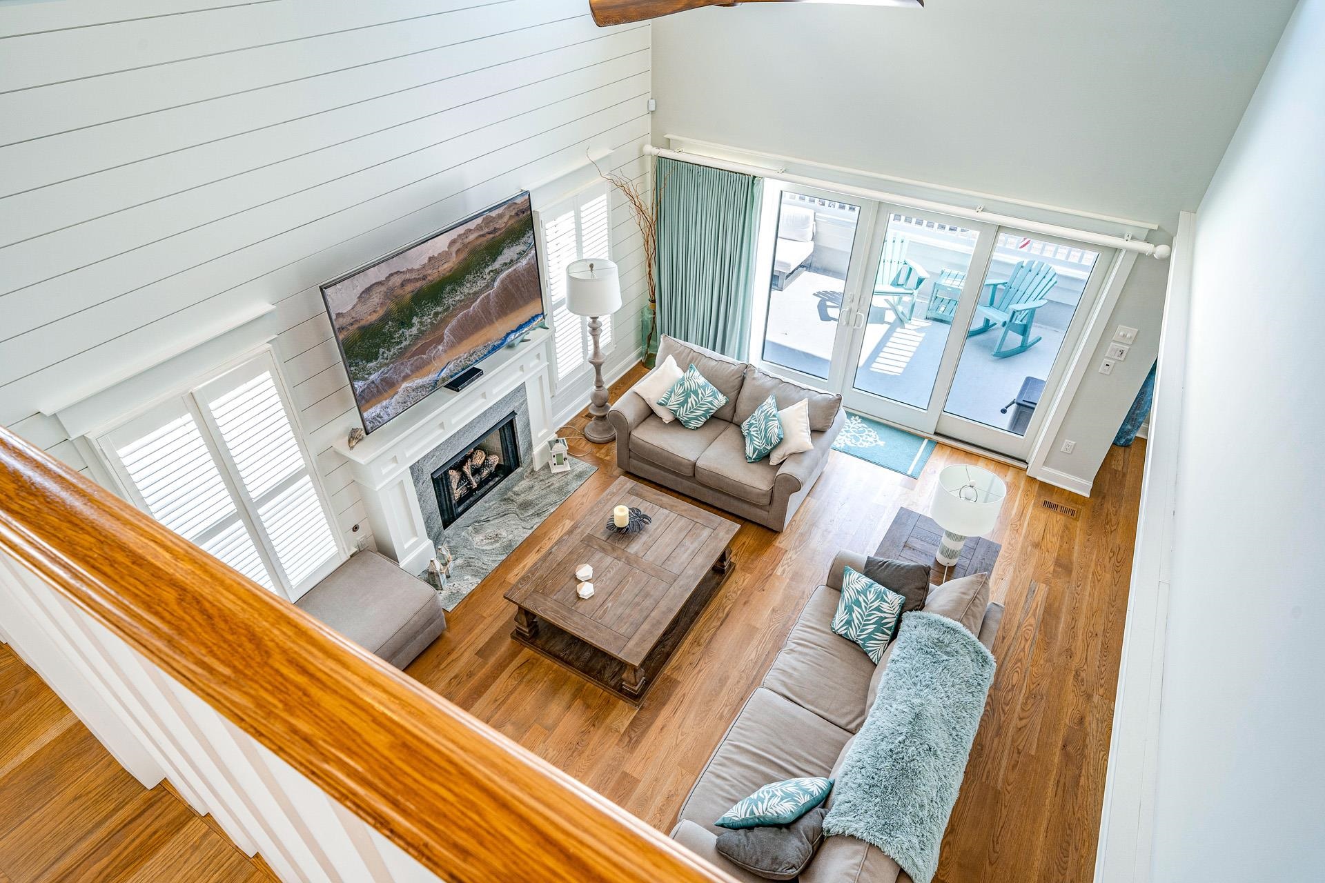 7418 Dune Drive Avalon, NJ 08202 - Photo 41 of 50 a living room with furniture and a flat screen tv