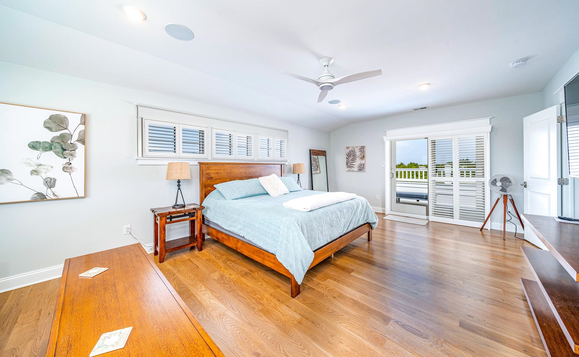 7418 Dune Drive Avalon, NJ 08202 - Photo 43 of 50 a bedroom with a bed and a table