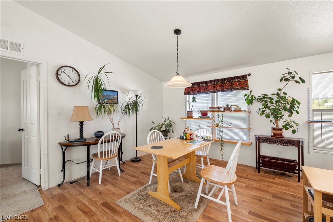 400 West Pechstein Road Pahrump, NV 89060 - Photo 11 of 50 13x12 dining room --manmade laminate flooring.