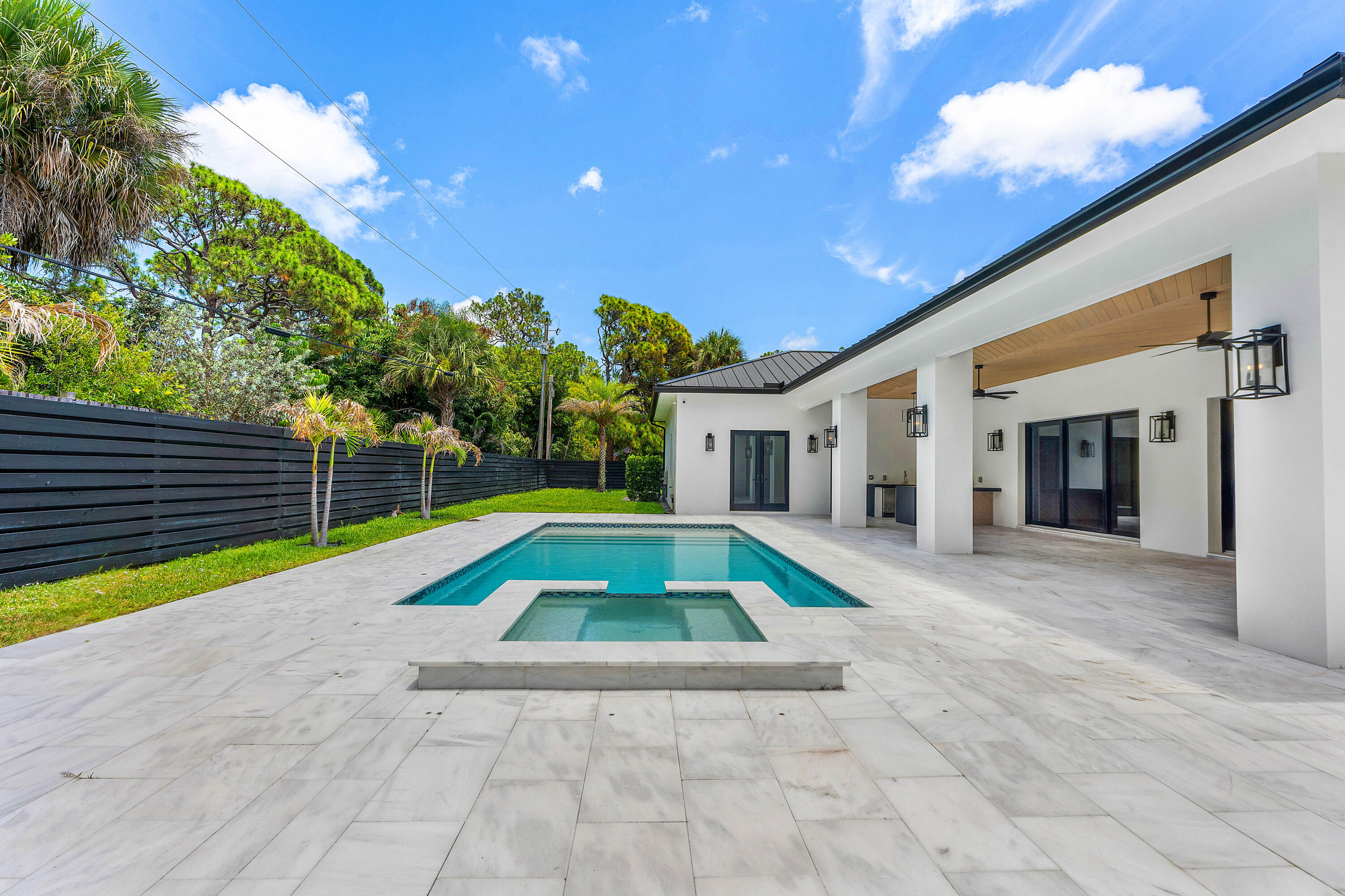 5701 Old Orange Road Jupiter, FL 33458 - Photo 19 of 46 a view of outdoor space deck and swimming pool