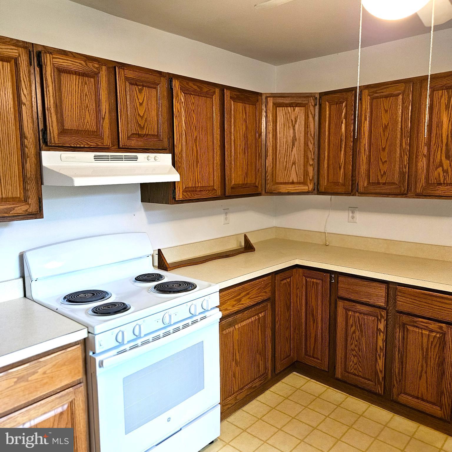7 Skyline Lane Washington, VA 22747 - Photo 21 of 42 a kitchen with a cabinets and a stove top oven