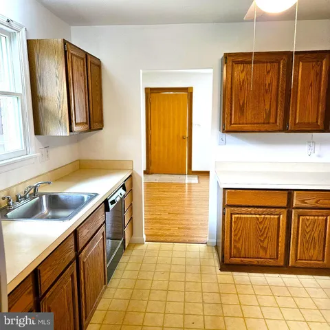 a bathroom with a sink a vanity and a mirror