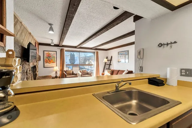 a bedroom with bed and a window