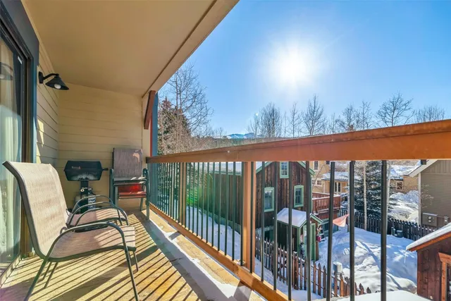 a view of a house with a tree