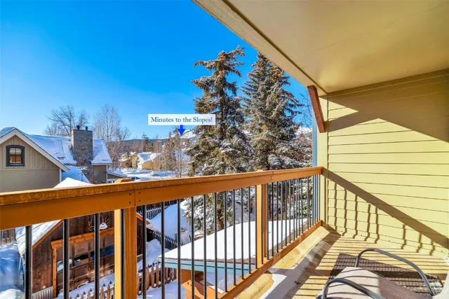 a view of a balcony and deck with patio