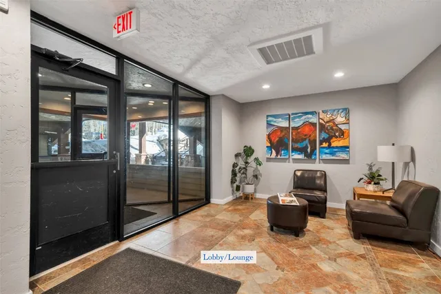 a kitchen with counter top space cabinets and appliances