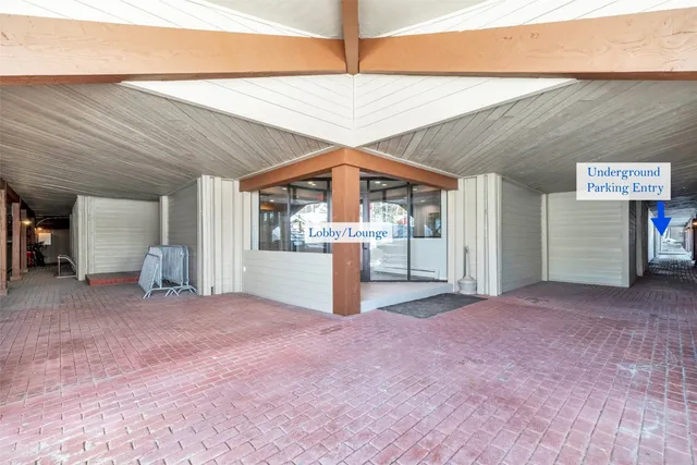 a picture of a bench in a white building