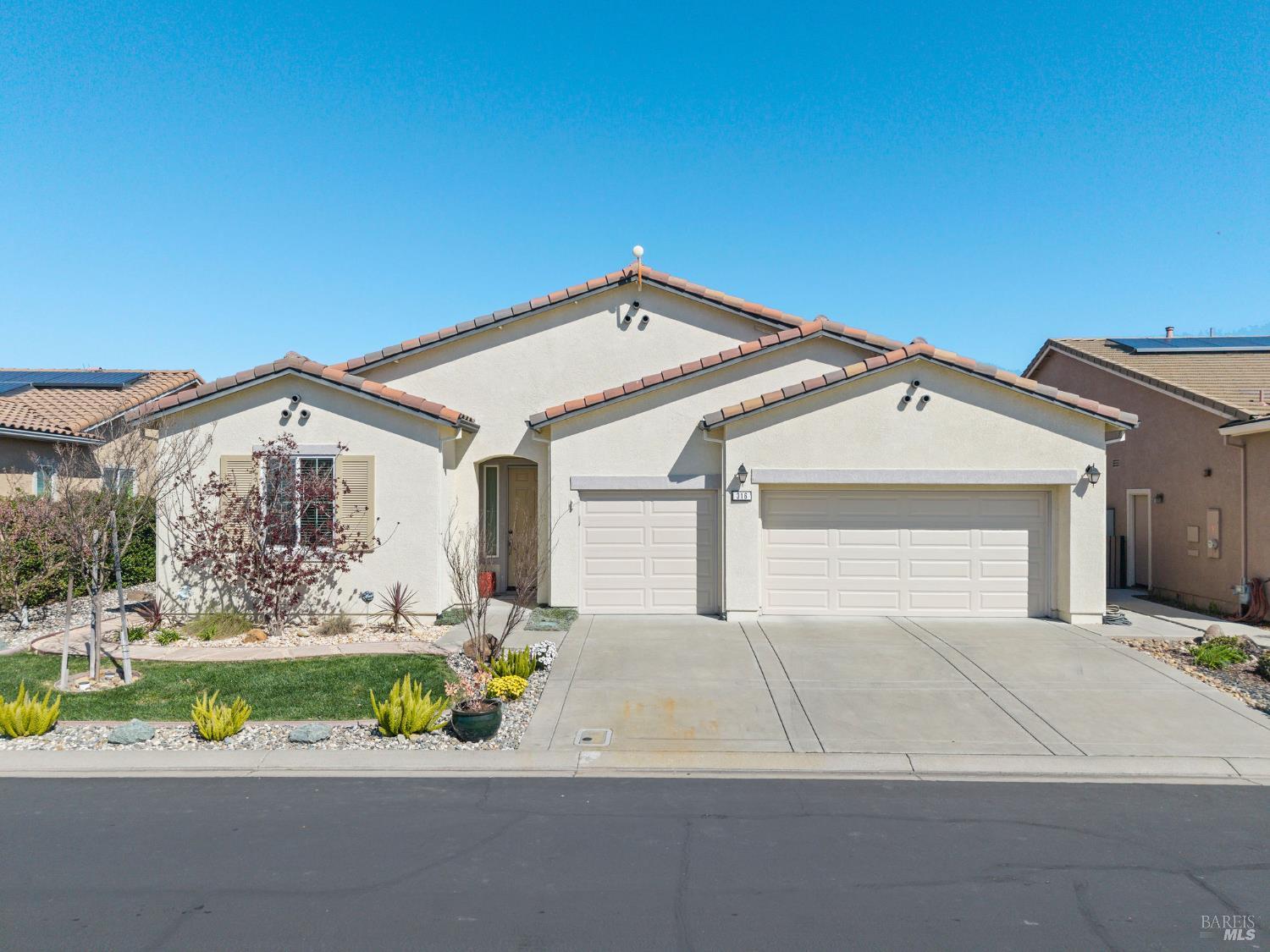 316 Birch Ridge Drive Rio Vista, CA 94571 - Photo 1 of 70 a front view of a house with a yard and potted plants