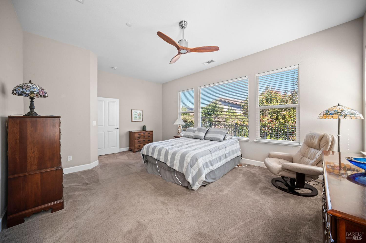 316 Birch Ridge Drive Rio Vista, CA 94571 - Photo 18 of 70 a spacious bedroom with a bed and a couch
