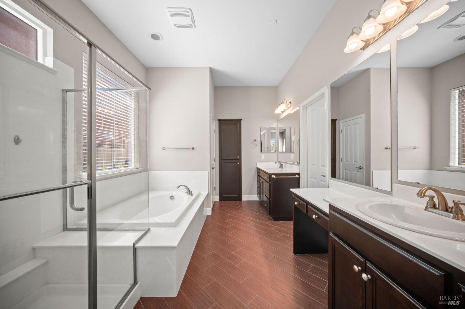 316 Birch Ridge Drive Rio Vista, CA 94571 - Photo 19 of 70 a spacious bathroom with a granite countertop sink a bathtub and mirror