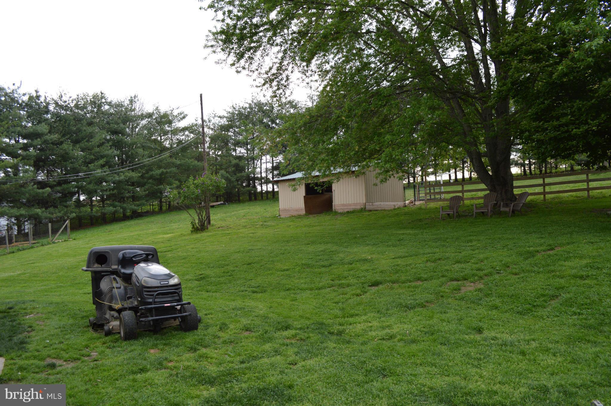60 East Nicodemus Road Westminster, MD 21157 - Photo 11 of 21 a big yard with table and chairs