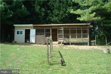 60 East Nicodemus Road Westminster, MD 21157 - Photo 21 of 21 a house view with a sitting space and garden