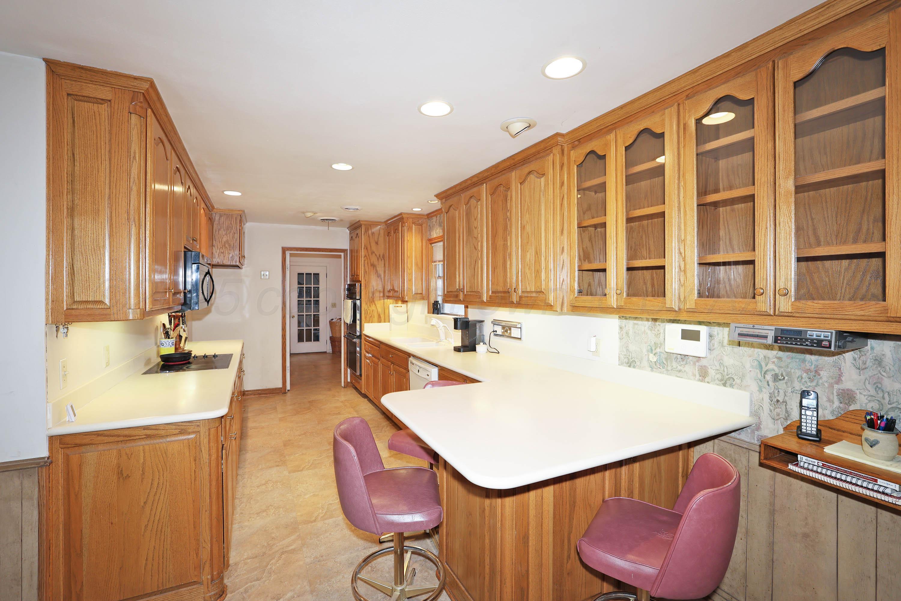 2816 Lloyd Drive Amarillo, TX 79110 - Photo 10 of 29 a kitchen with a sink appliances and cabinets
