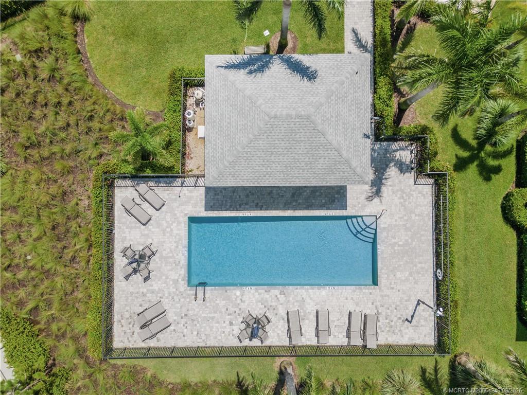 380 Southeast Sea Hunt Way Stuart, FL 34994 - Photo 34 of 42 an aerial view of a house with a yard