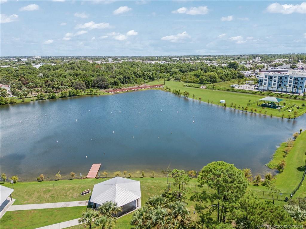 380 Southeast Sea Hunt Way Stuart, FL 34994 - Photo 37 of 42 an aerial view of a residential houses with outdoor space and lake view