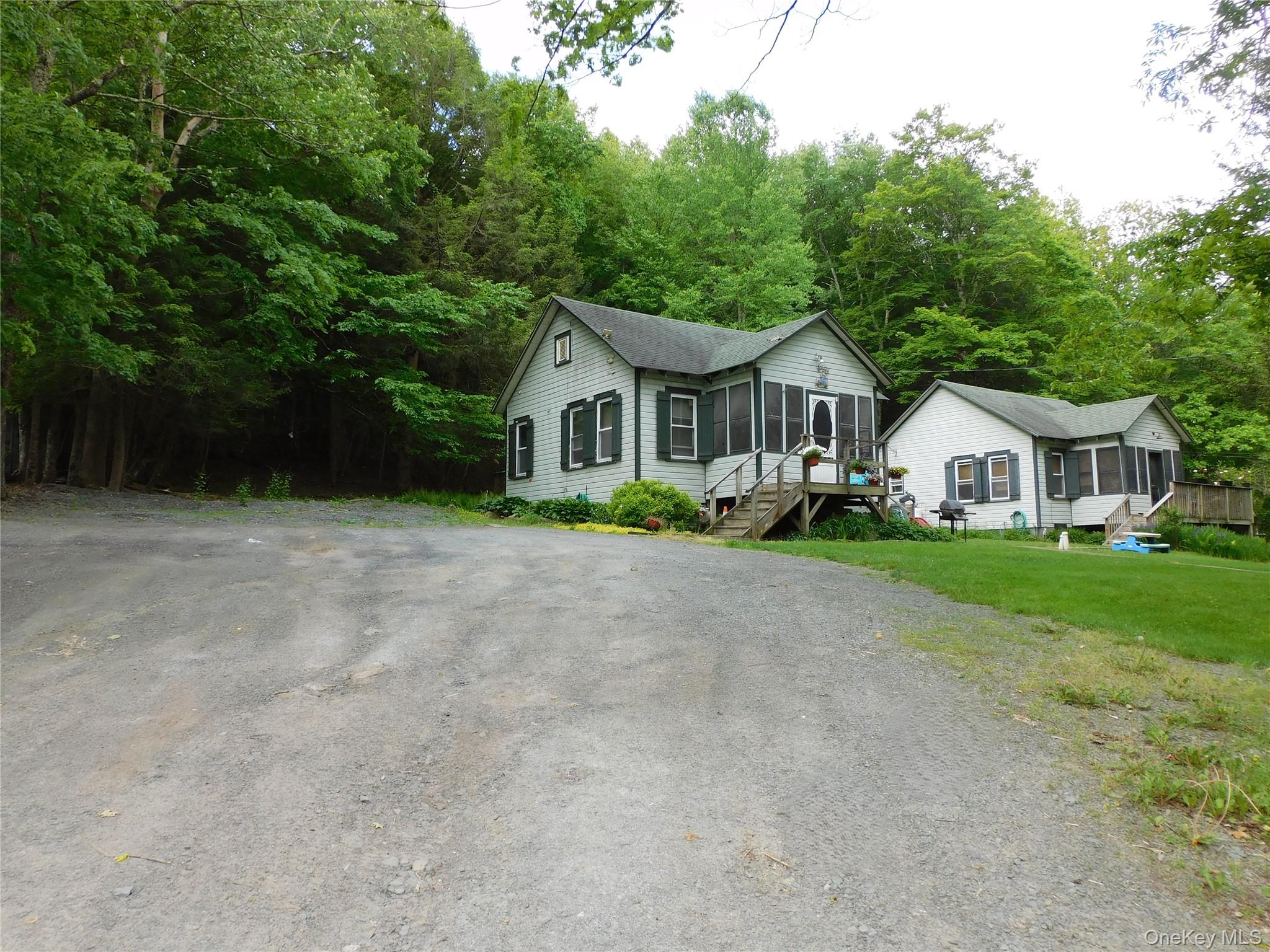 18-20 Church Road Mountain Dale, NY 12763 - Photo 5 of 20 a view of house with yard and green space