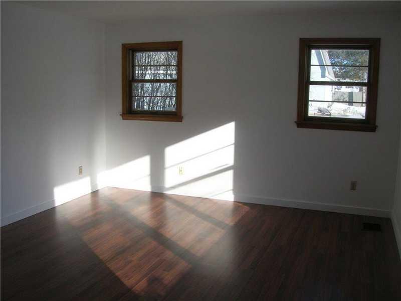15 Sandy Point Road Milford, ME 04461 - Photo 6 of 15 Living Room.