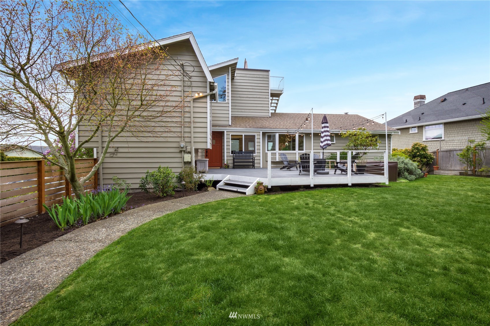 831 Pine Street Edmonds, WA 98020 - Photo 1 of 35 a view of a house with a backyard
