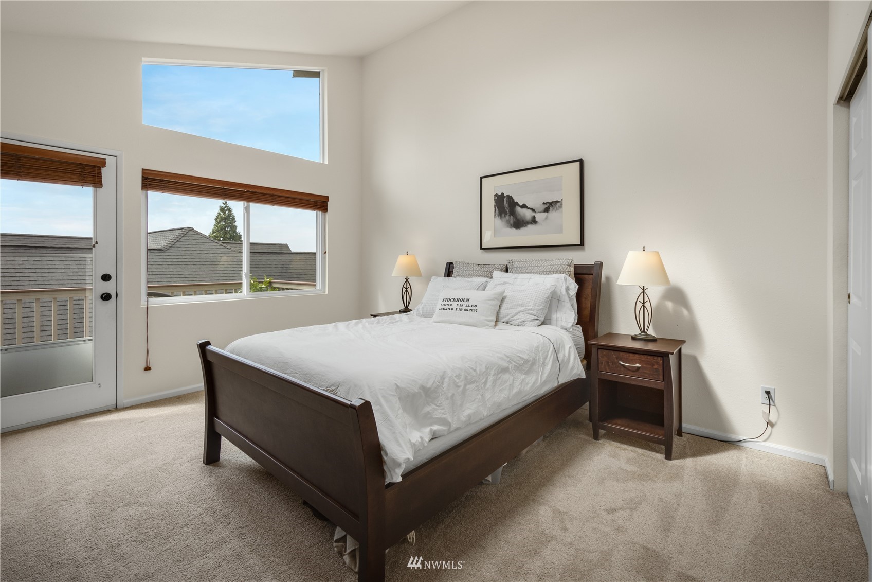 831 Pine Street Edmonds, WA 98020 - Photo 11 of 35 a bedroom with a bed and window