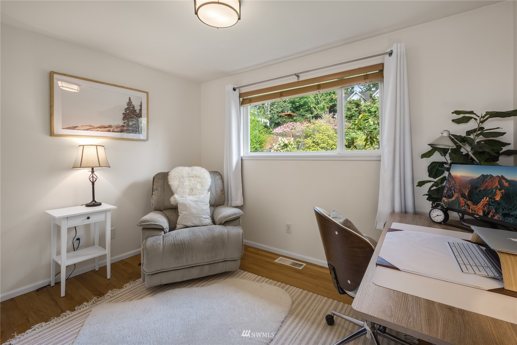 831 Pine Street Edmonds, WA 98020 - Photo 17 of 35 a living room with furniture and a window