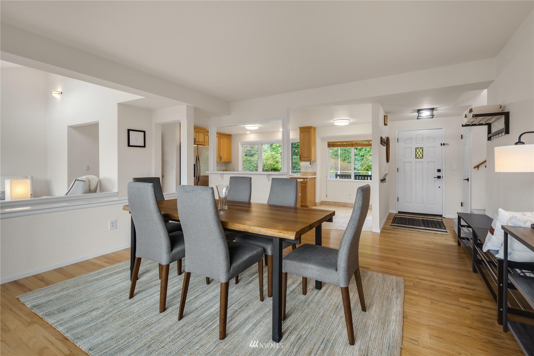 831 Pine Street Edmonds, WA 98020 - Photo 6 of 35 a view of a dining room with furniture and wooden floor