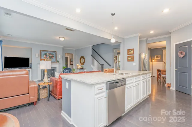 a view of a kitchen and a sink