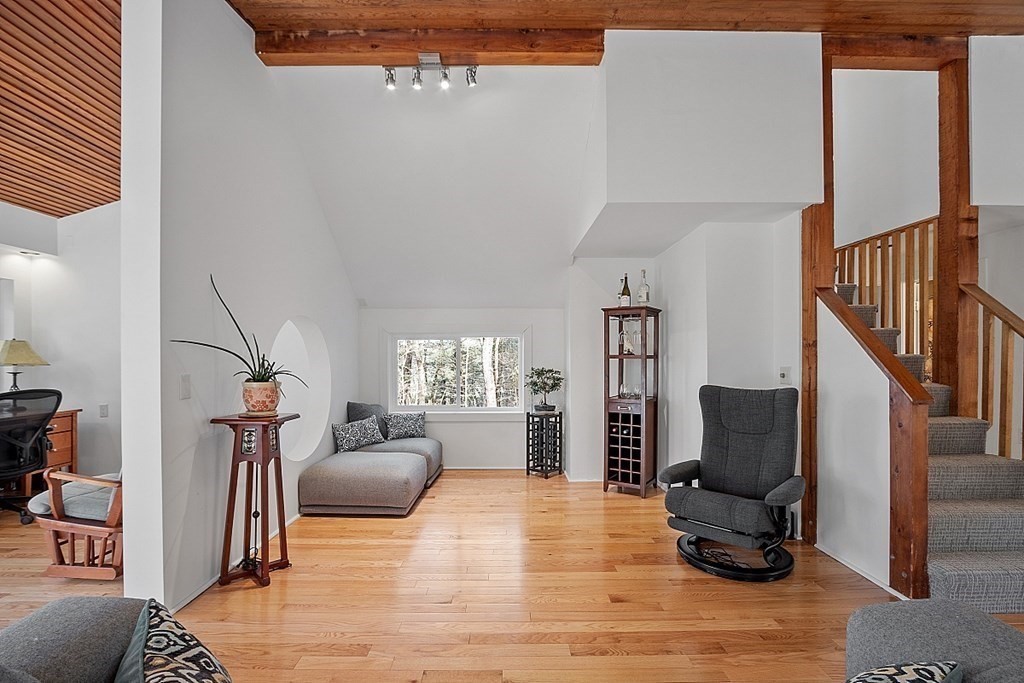 10 Orch Hl Road Harvard, MA 01451 - Photo 11 of 33 a living room with furniture and a flat screen tv