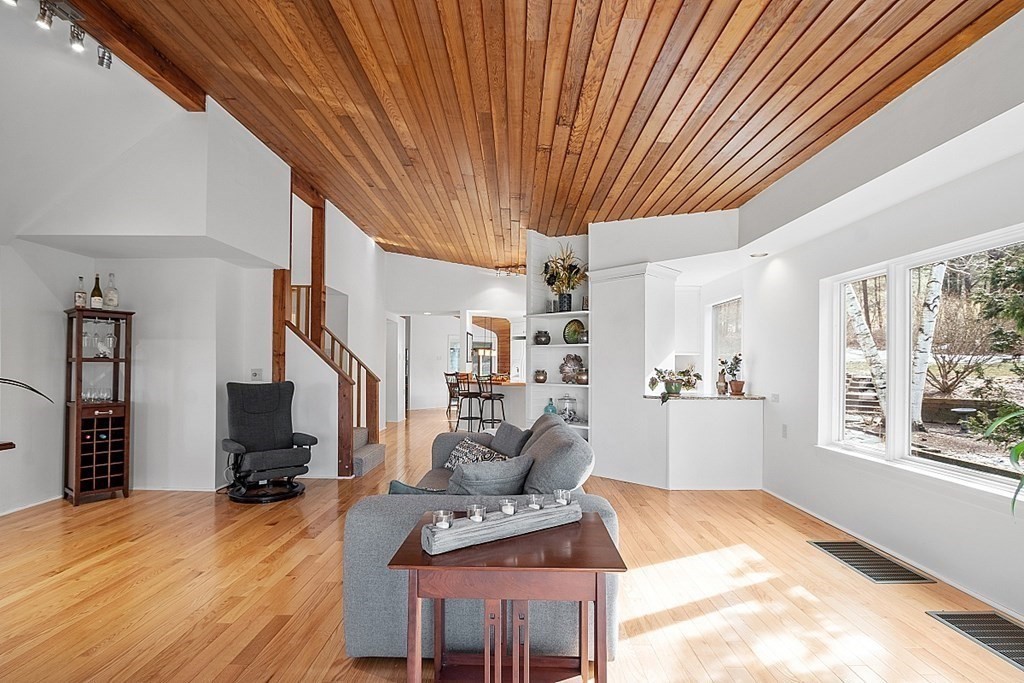10 Orch Hl Road Harvard, MA 01451 - Photo 12 of 33 a view of a livingroom with wooden floor and furniture