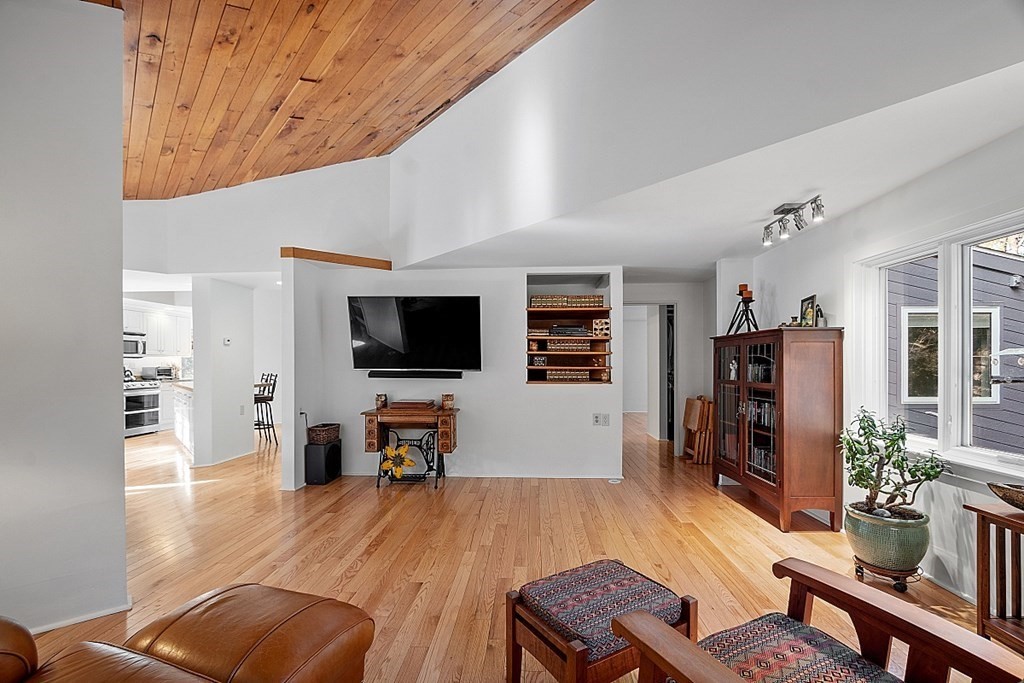 10 Orch Hl Road Harvard, MA 01451 - Photo 16 of 33 a living room with furniture and a flat screen tv
