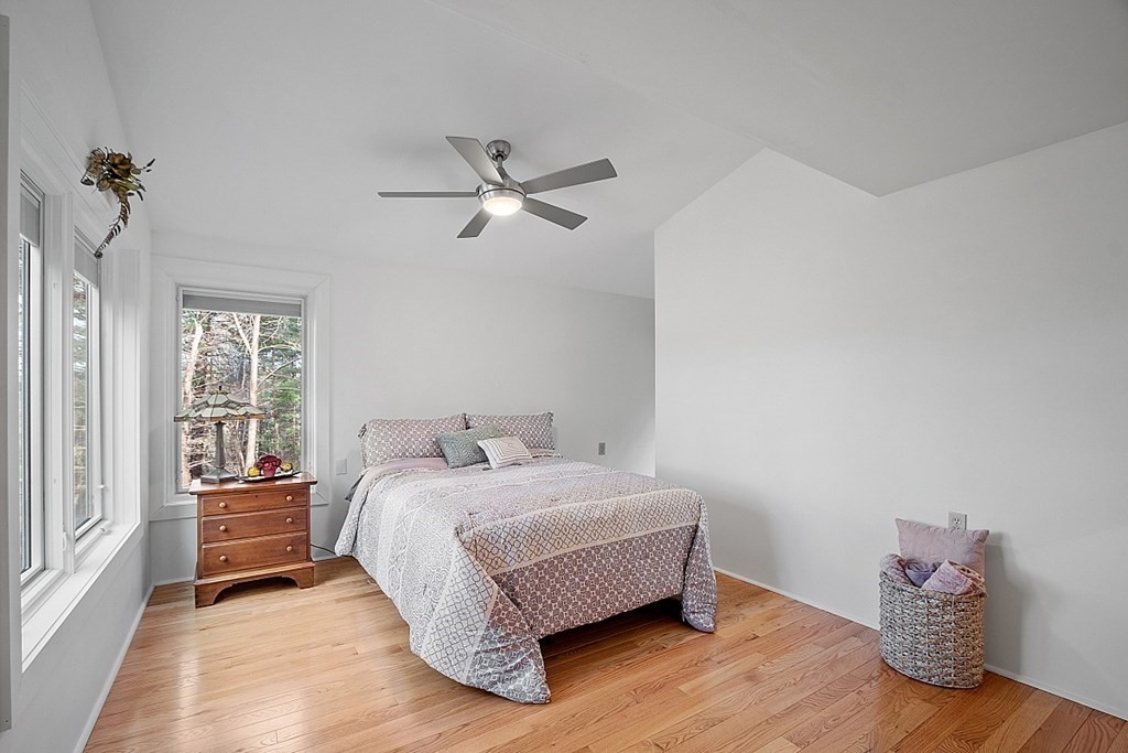 10 Orch Hl Road Harvard, MA 01451 - Photo 17 of 33 a bedroom with a bed and a window