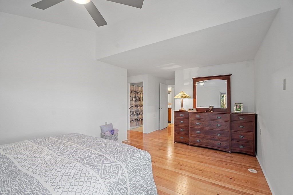 10 Orch Hl Road Harvard, MA 01451 - Photo 18 of 33 a room with a bed and wooden floor