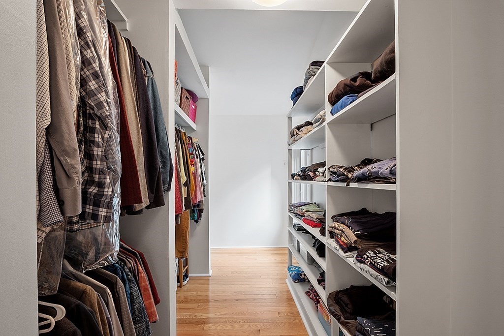 10 Orch Hl Road Harvard, MA 01451 - Photo 19 of 33 a view of walk in closet with clothes and shoes
