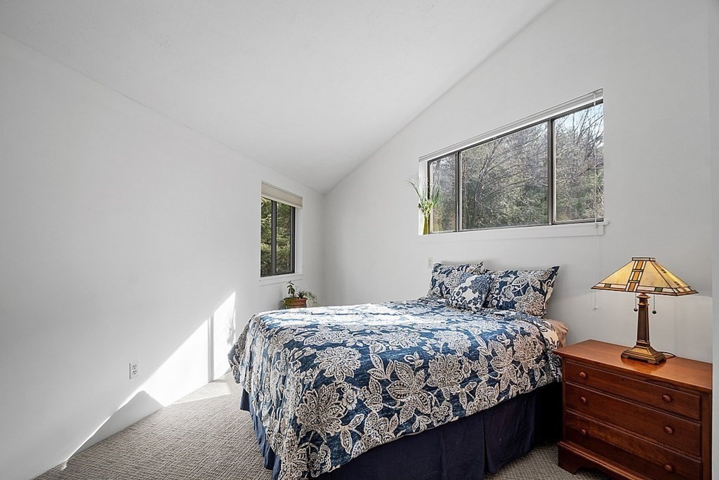 10 Orch Hl Road Harvard, MA 01451 - Photo 21 of 33 a bedroom with a bed and wooden floor