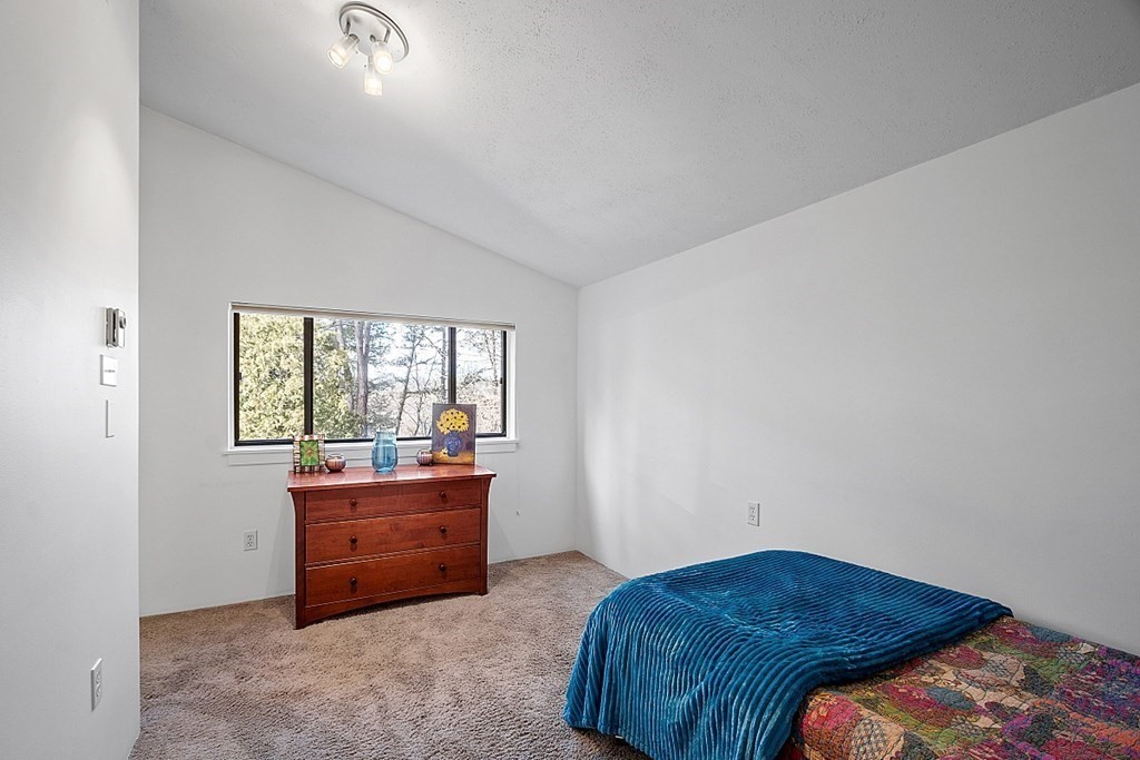 10 Orch Hl Road Harvard, MA 01451 - Photo 23 of 33 a bedroom with a bed and a window