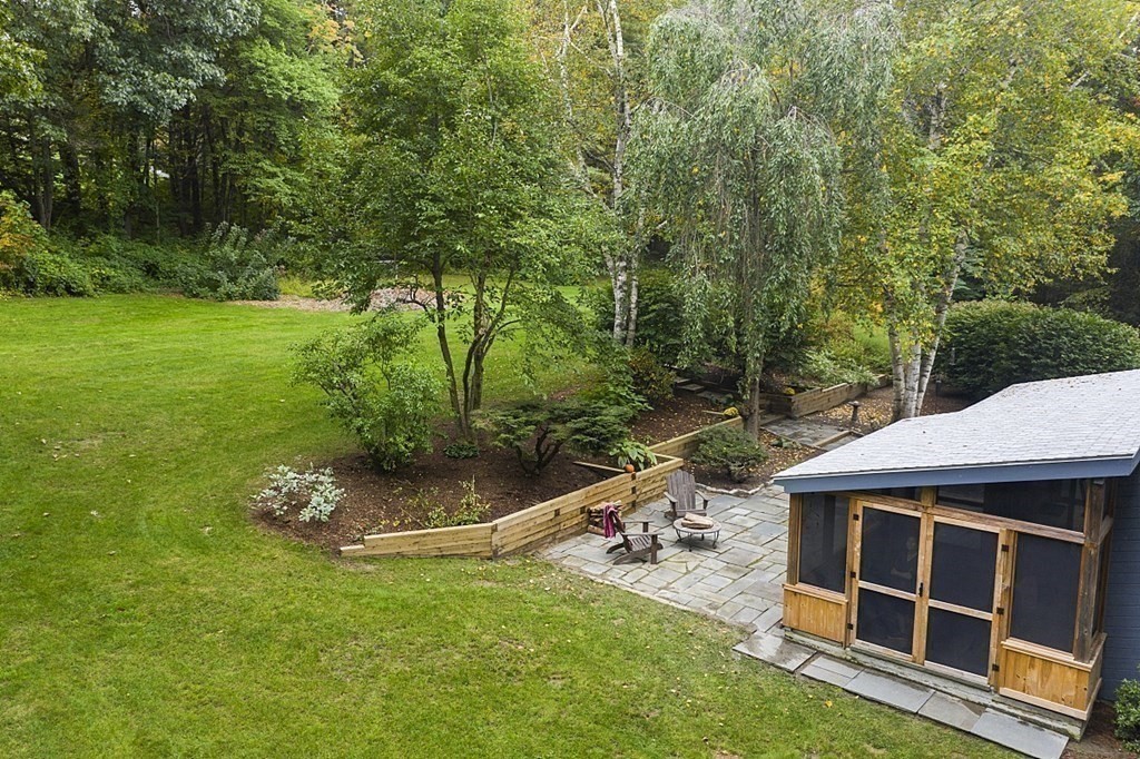 10 Orch Hl Road Harvard, MA 01451 - Photo 3 of 33 a backyard of a house with a yard