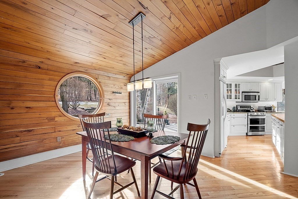 10 Orch Hl Road Harvard, MA 01451 - Photo 8 of 33 a dining room with furniture and wooden floor