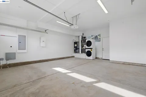a view of a utility room with windows