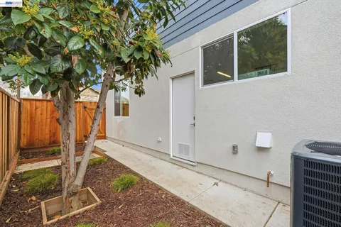 a backyard of a house with seating space