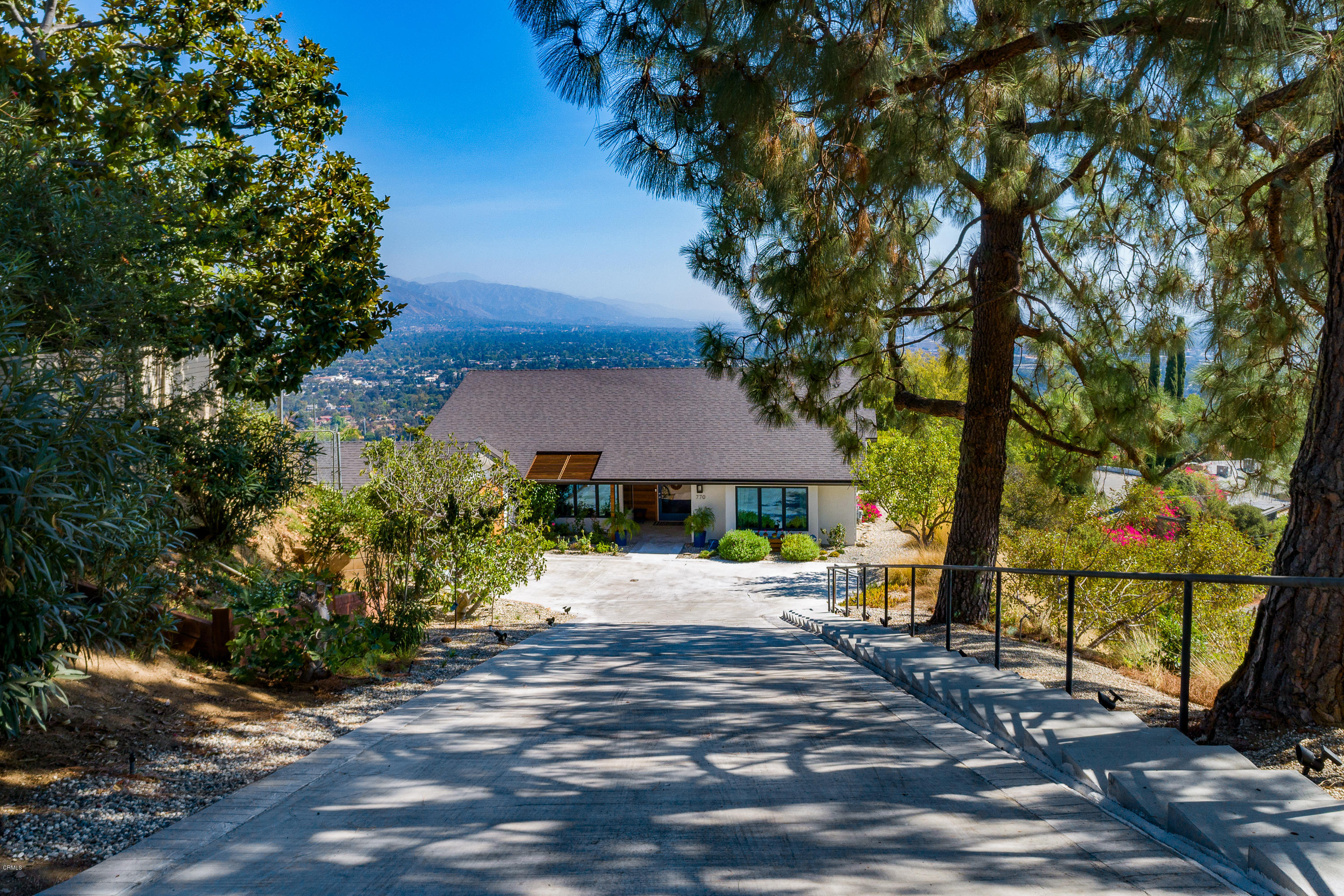 770 Panorama Place Pasadena, CA 91105 - Photo 2 of 47 a view of a house with a tree in the background