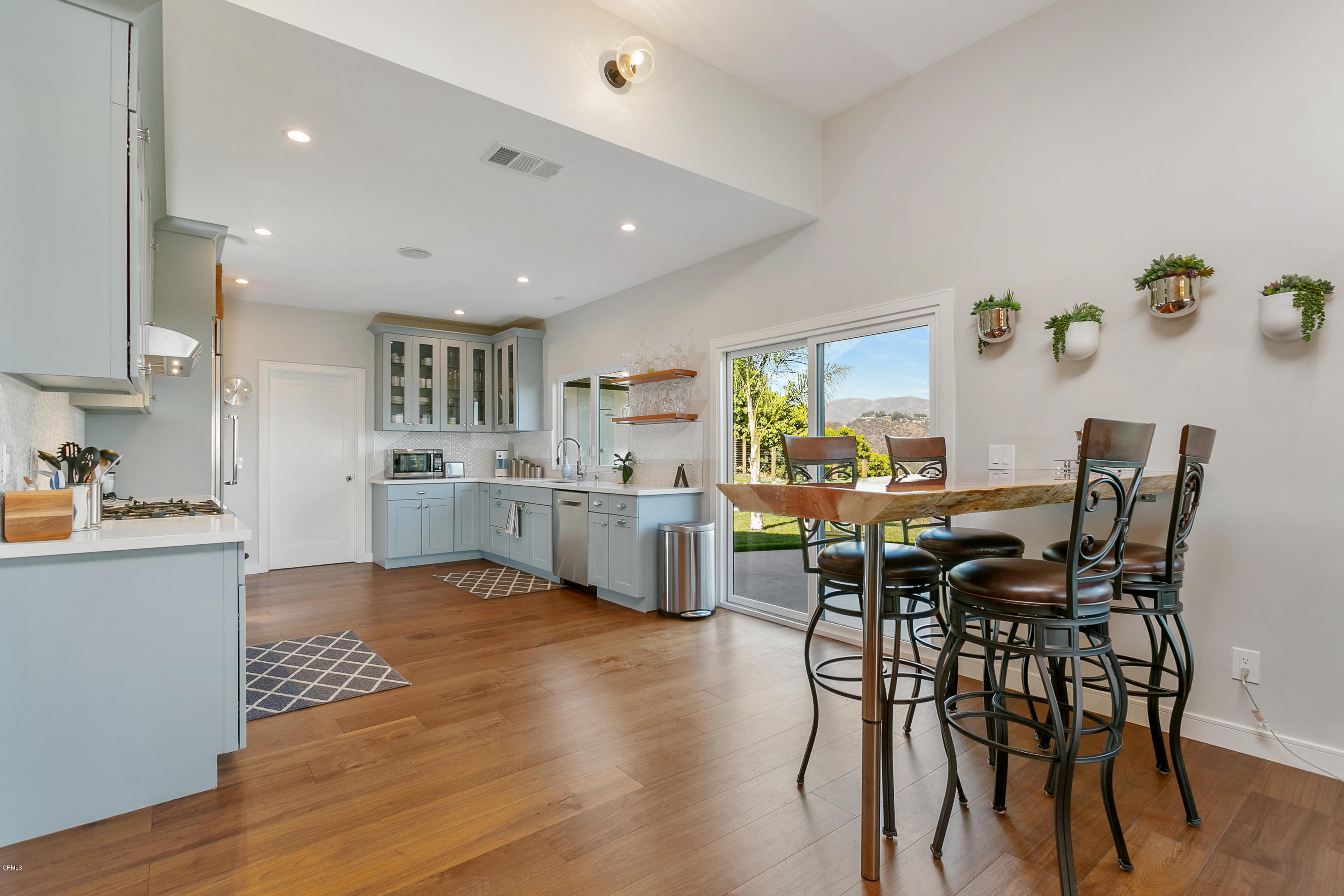 770 Panorama Place Pasadena, CA 91105 - Photo 14 of 47 a view of kitchen with cabinets table and chairs