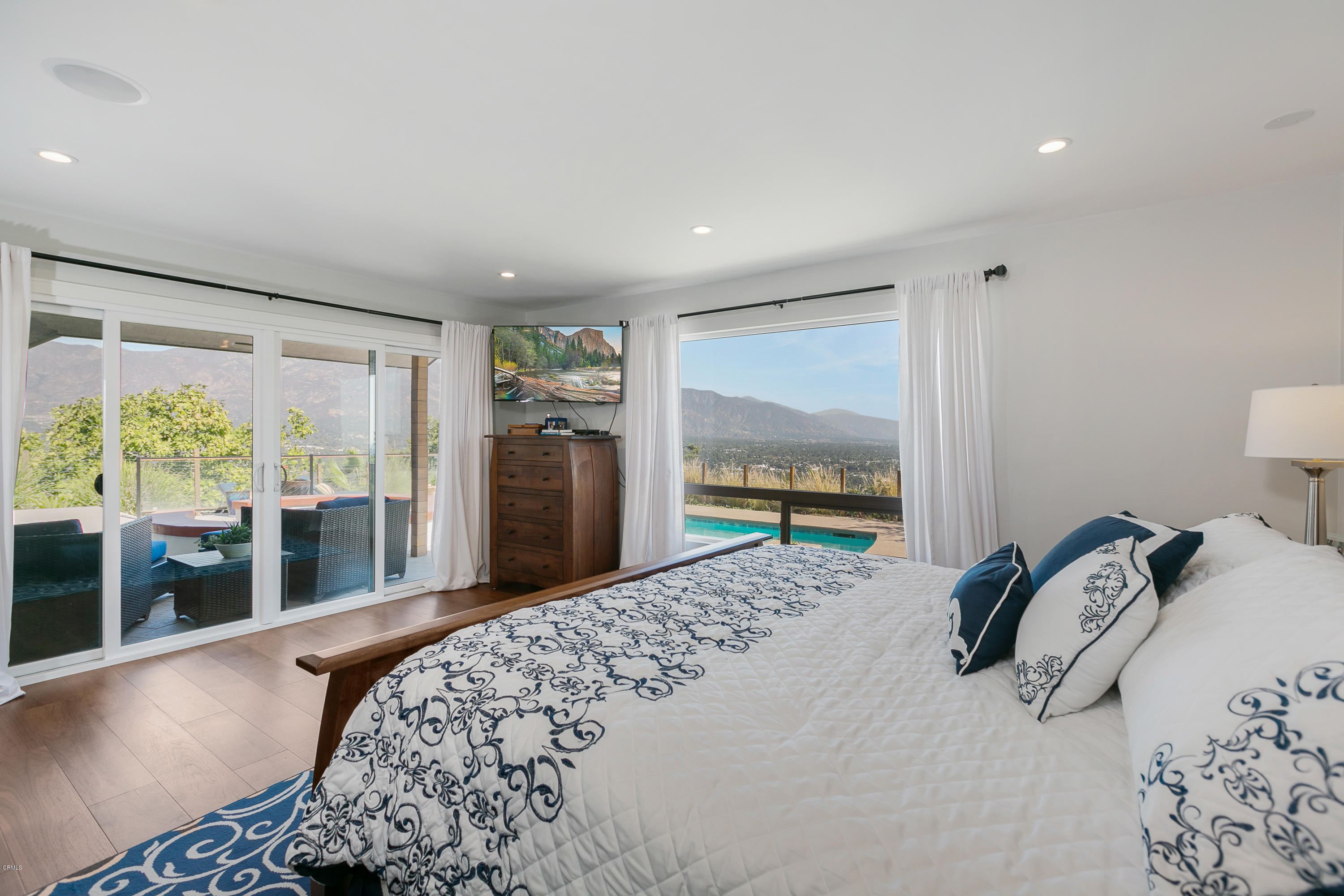 770 Panorama Place Pasadena, CA 91105 - Photo 18 of 47 a bedroom with bed and glass window